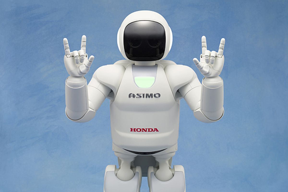 ASIMO có thể mở chai nước, rót trà và bắt tay một cách lịch sự.